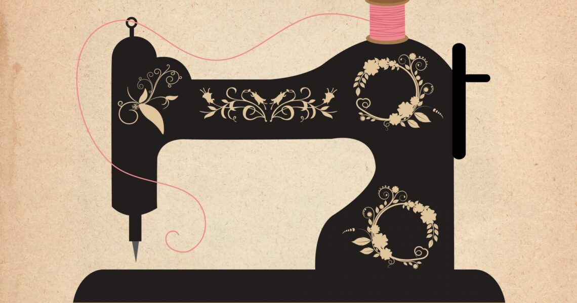 Decorative illustration of a vintage black sewing machine with gold floral ornament